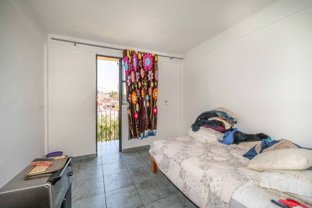 Nine-unit apartment building with varied layouts—ideal for investment. — Lindavista, San Miguel de Allende — photo 11