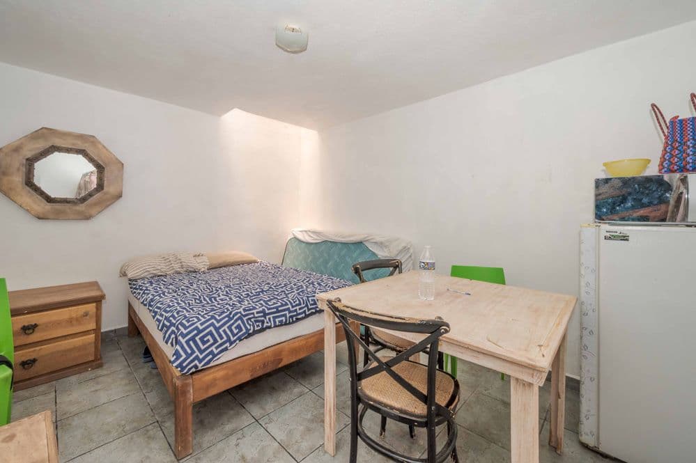 Nine-unit apartment building with varied layouts—ideal for investment. — Lindavista, San Miguel de Allende — photo 13