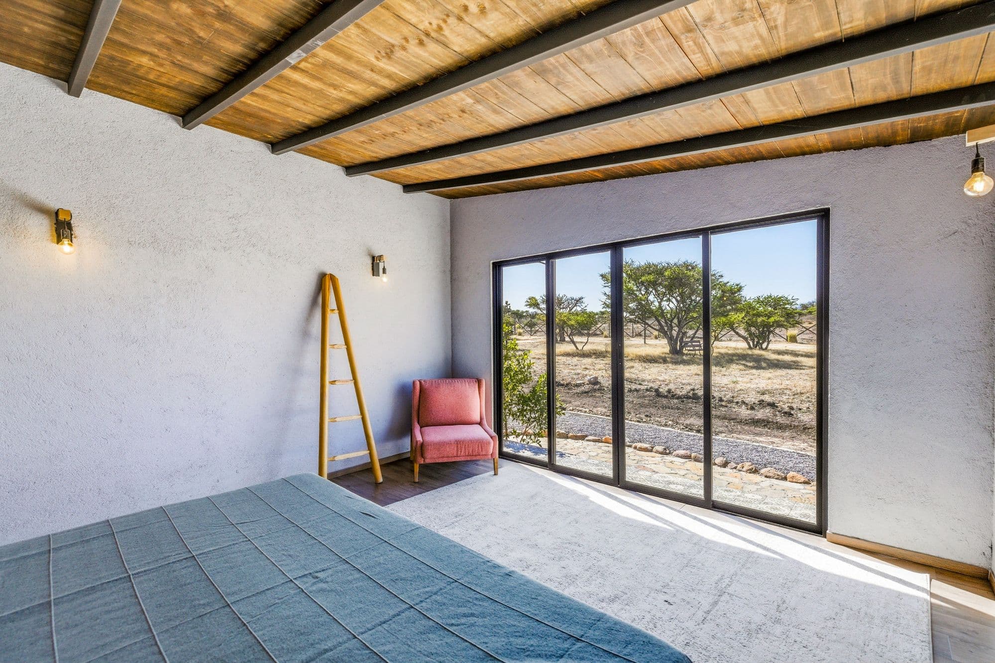 Casa Pavo Real — Sosnabar, San Miguel de Allende — photo 15 — sun-drenched modern living with pastoral views