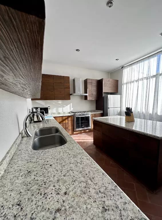 Casa Paraiso Arcangeles — El Paraiso, San Miguel de Allende — photo 2 — contemporary kitchen with luminous natural light