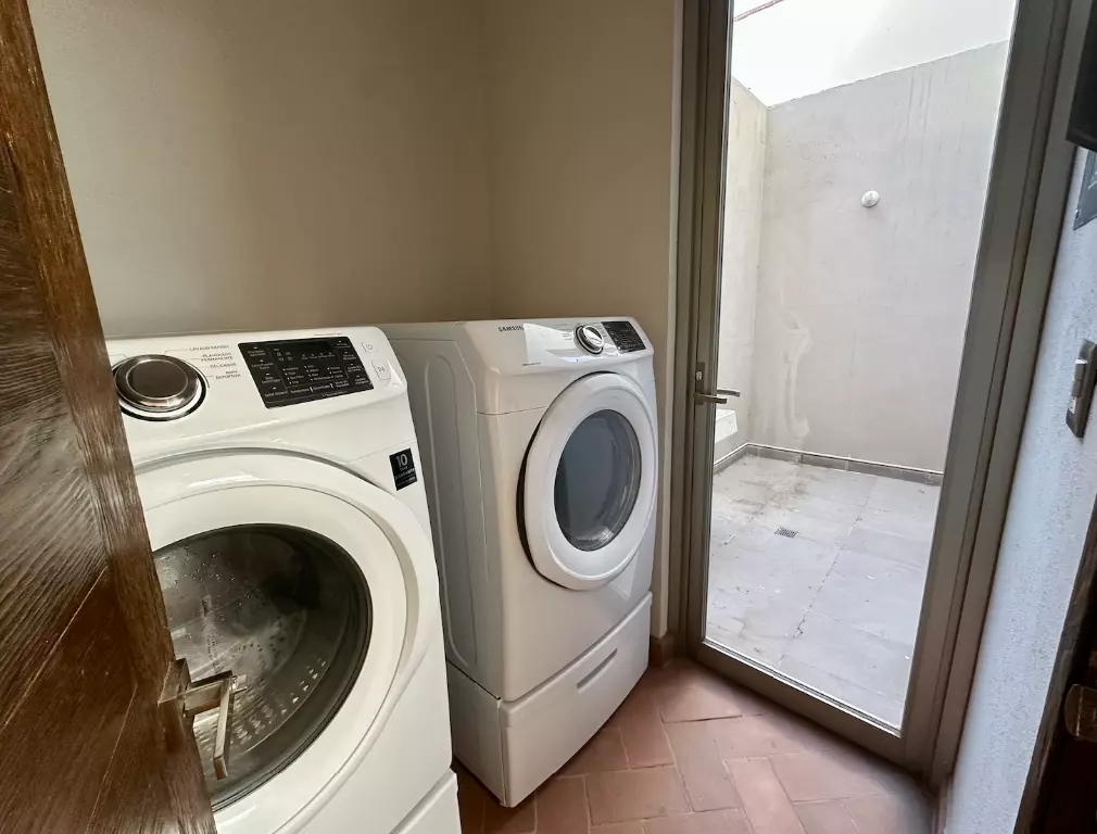 Casa Paraiso Arcangeles — El Paraiso, San Miguel de Allende — photo 7 — modern laundry room, bright natural light