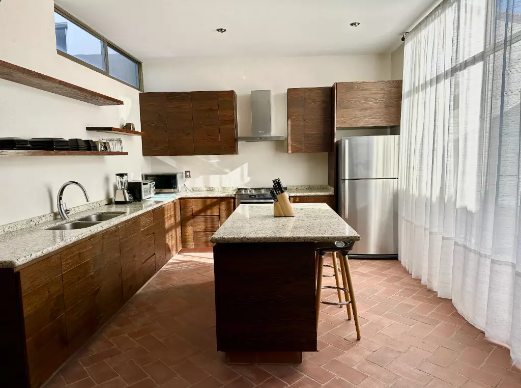 Casa Paraiso Arcangeles — El Paraiso, San Miguel de Allende — photo 10 — sunlit traditional kitchen with authentic charm