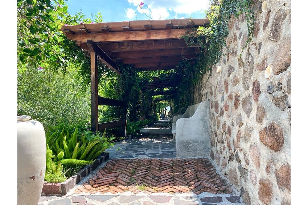 Casa Huerta La Antigua — Antigua Residencial, San Miguel de Allende — photo 58 — charming pergola passage, rustic elegance