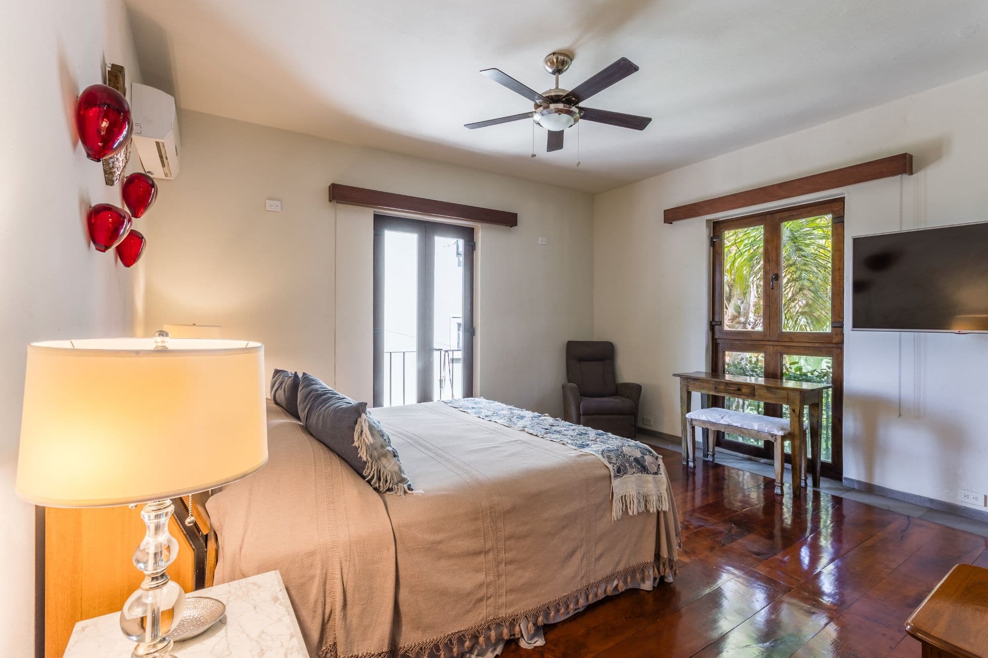 Casa de los Limones — San Antonio, San Miguel de Allende — photo 20 — serene master suite, tropical garden views