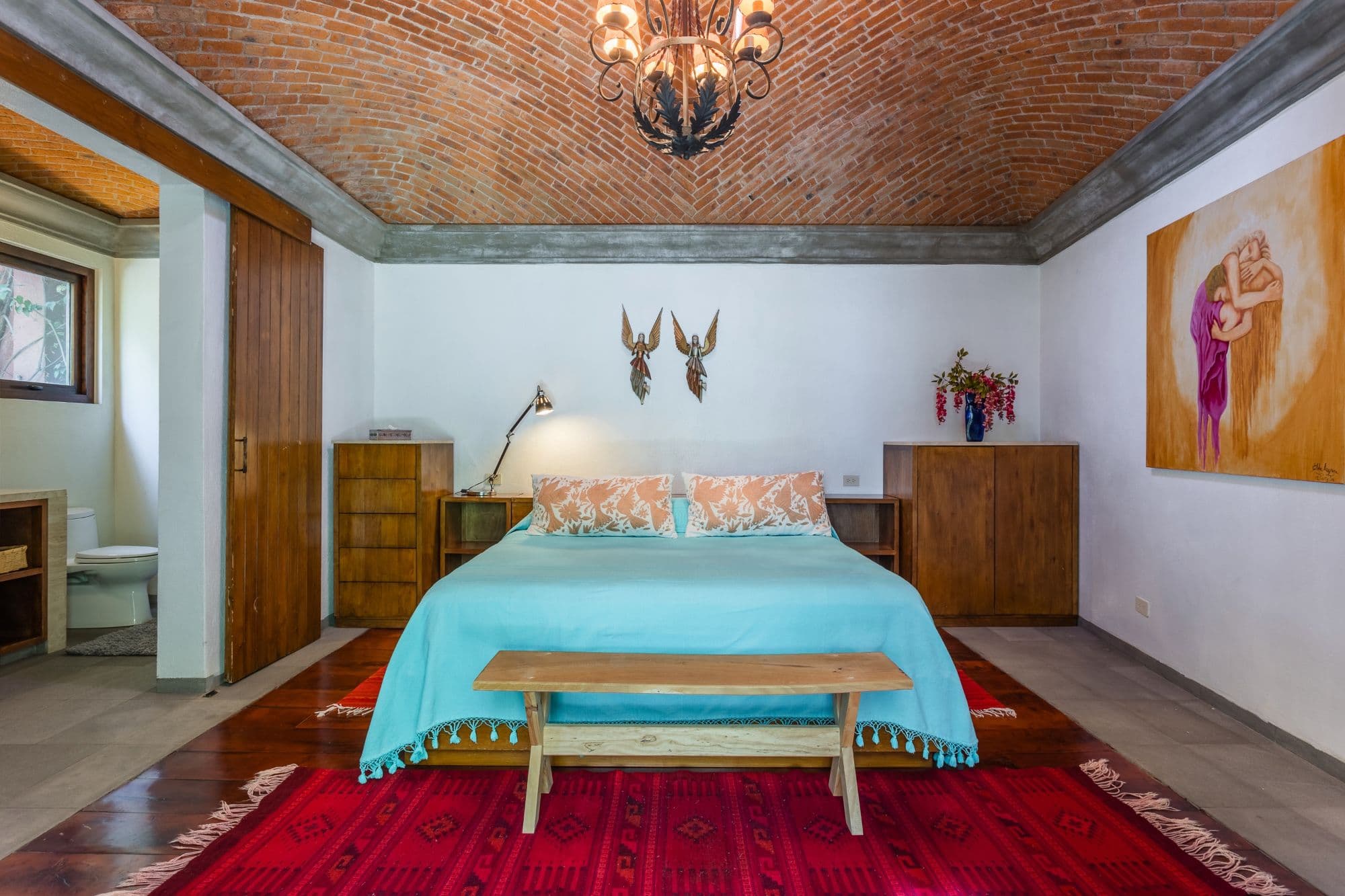 Casa de los Limones — San Antonio, San Miguel de Allende — photo 12 — rustic-elegant master suite, soaring brick ceilings