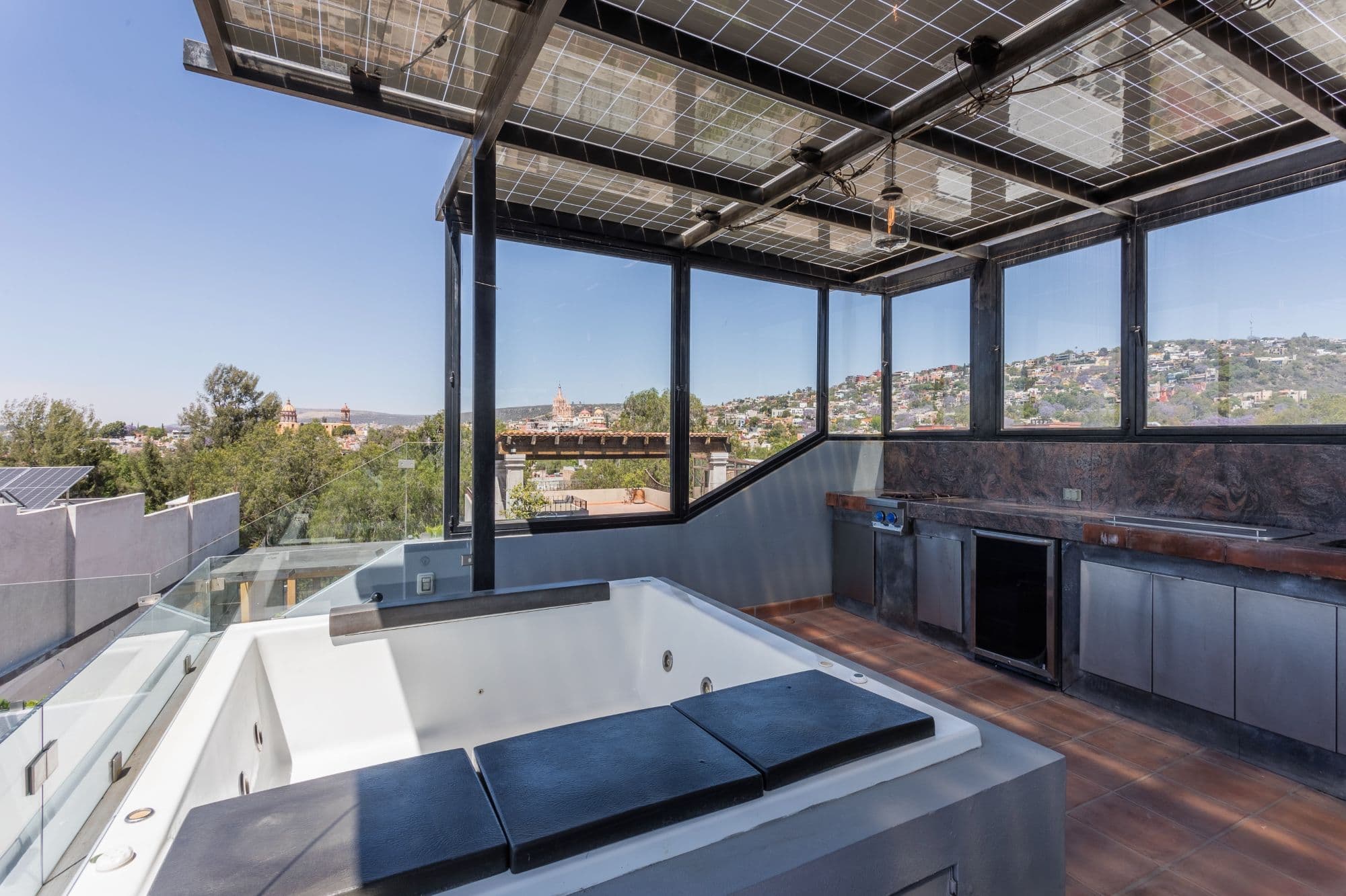 Casa de los Limones — San Antonio, San Miguel de Allende — photo 30 — panoramic rooftop spa with solar elegance