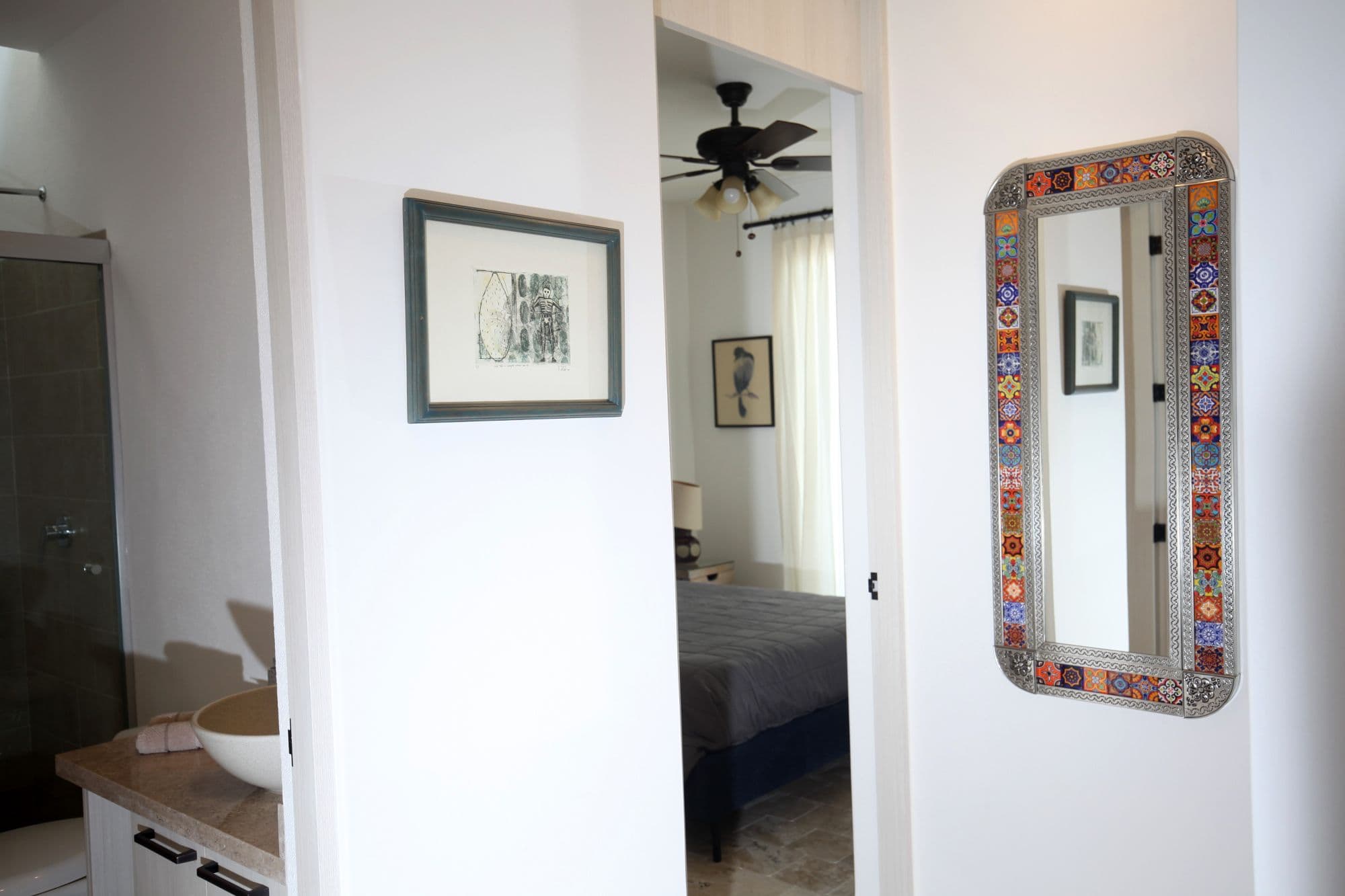 Casa Angeles Residencial La Luminaria — Atascadero (Arcos de San Miguel), San Miguel de Allende — photo 27 — bright hallway with artisanal mirror details