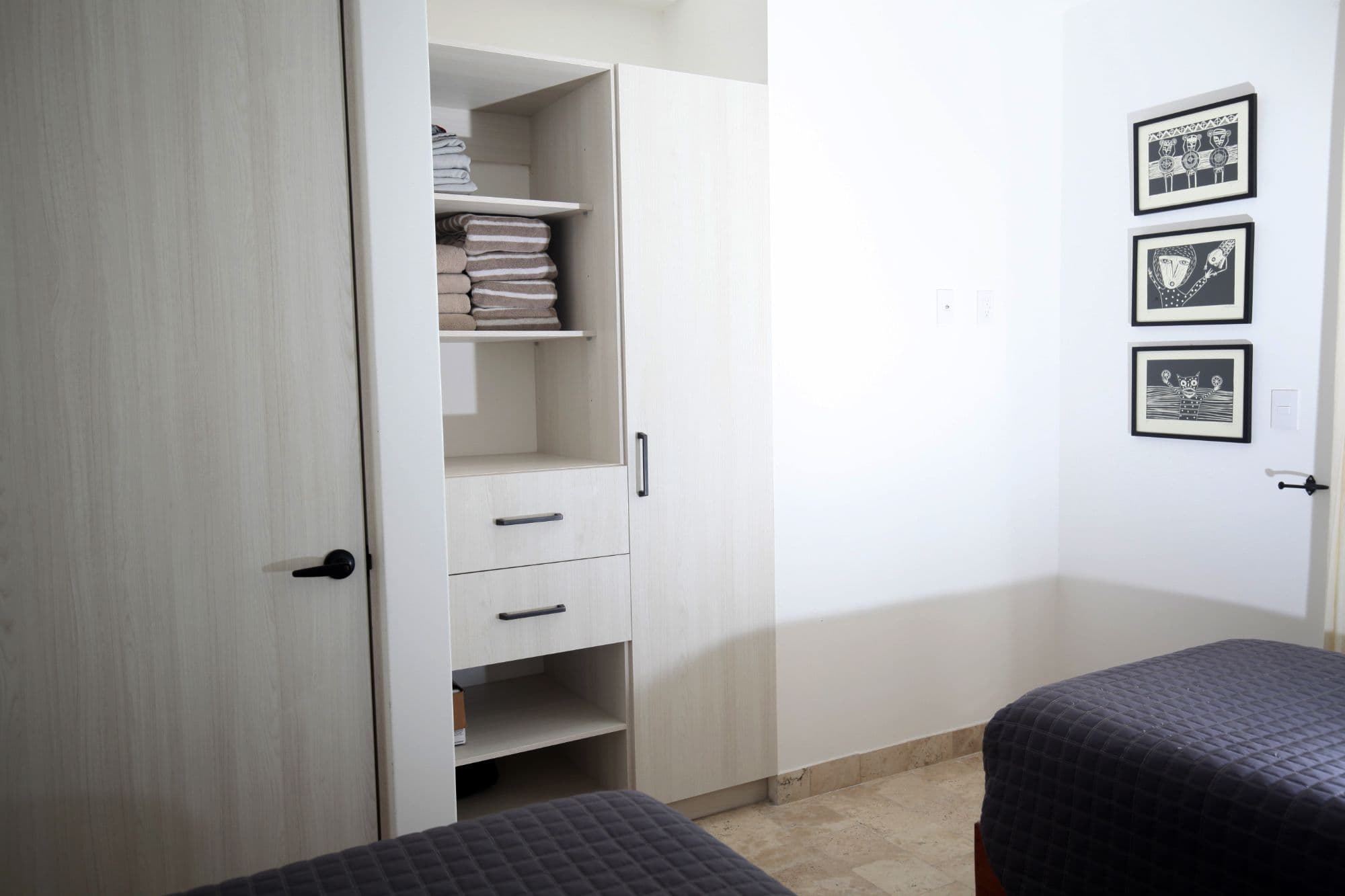 Casa Angeles Residencial La Luminaria — Atascadero (Arcos de San Miguel), San Miguel de Allende — photo 24 — bright guest quarters, thoughtful storage solutions