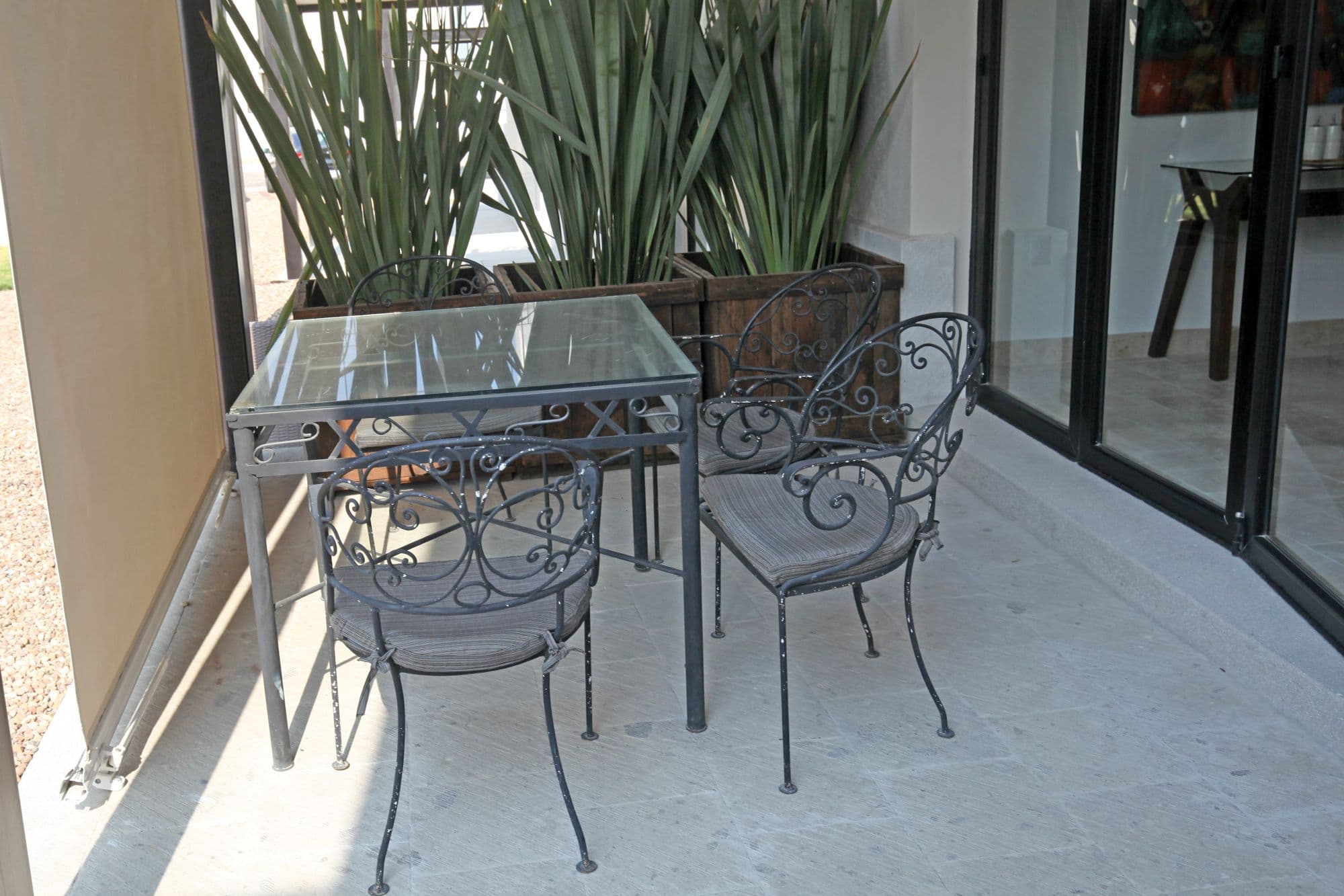 Casa Angeles Residencial La Luminaria — Atascadero (Arcos de San Miguel), San Miguel de Allende — photo 29 — charming covered terrace, wrought iron details