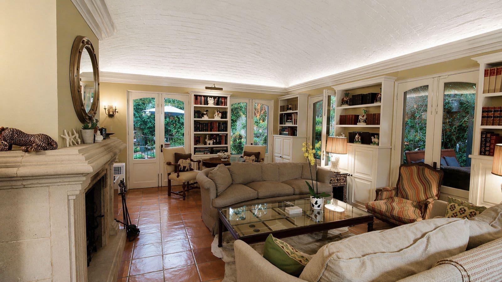 Casa Baeza — Centro, San Miguel de Allende — photo 7 — elegant sunlit library with garden views