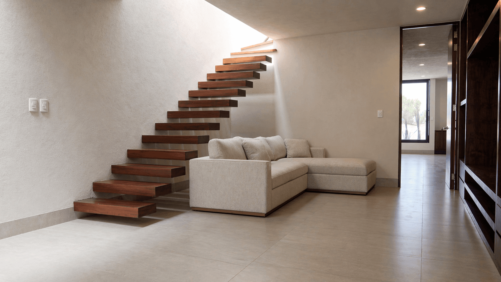 Casa nueva en la Conspiración — Valle del Maíz, San Miguel de Allende — photo 8 — contemporary floating staircase, luminous living space