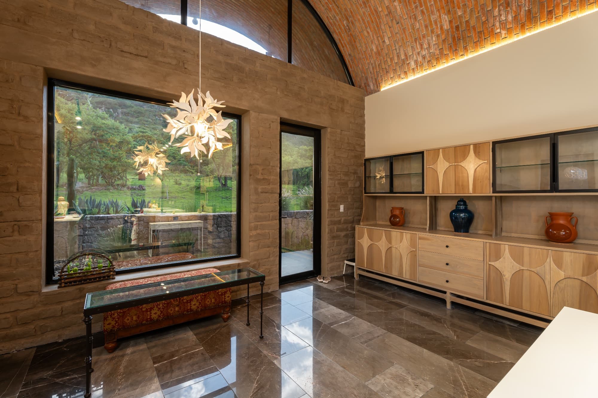 Santuario Tierra Viva — Sosnabar, San Miguel de Allende — photo 23 — luminous gallery showcasing verdant hillside views