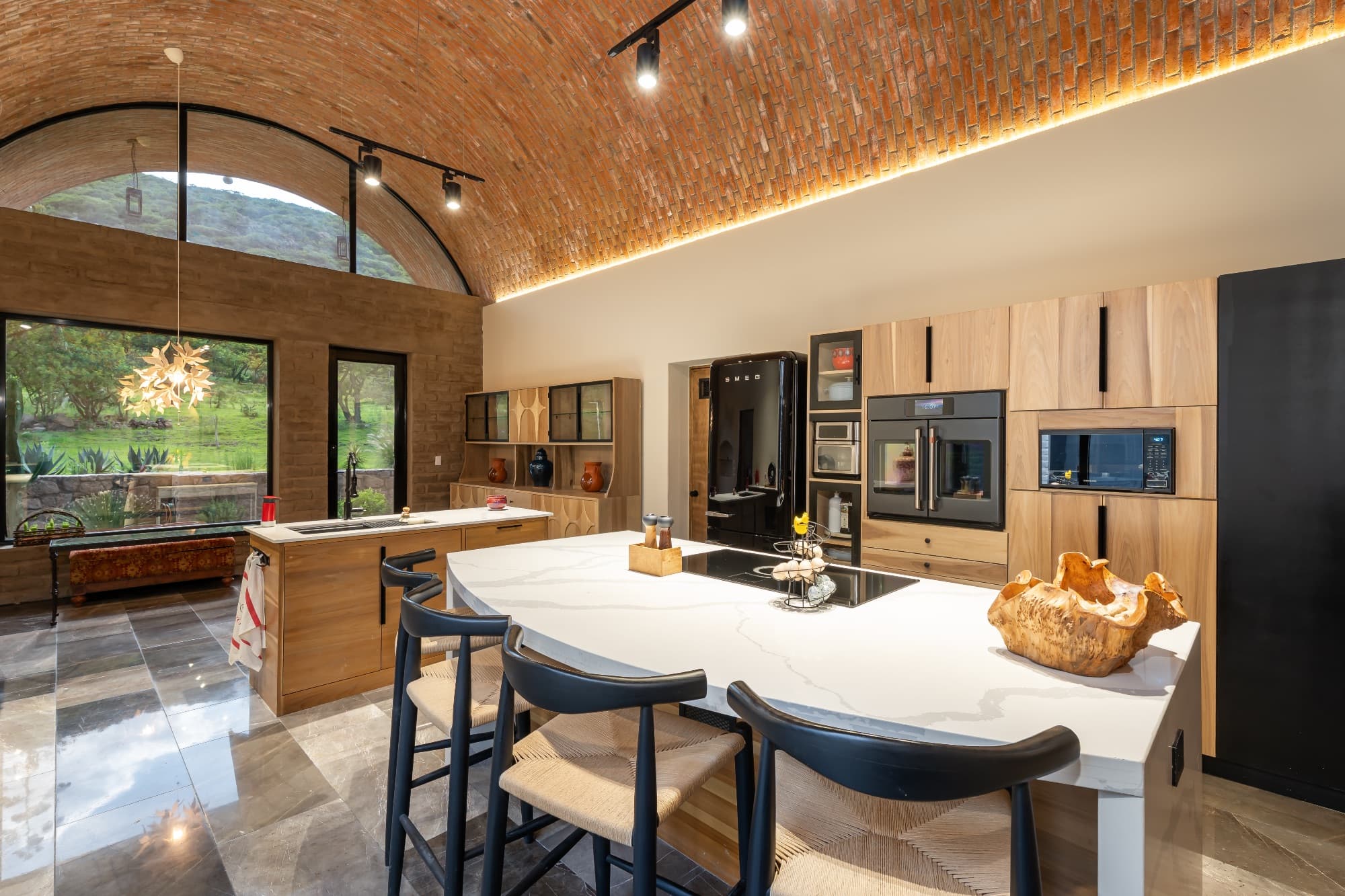 Santuario Tierra Viva — Sosnabar, San Miguel de Allende — photo 21 — contemporary luxury kitchen with soaring architecture