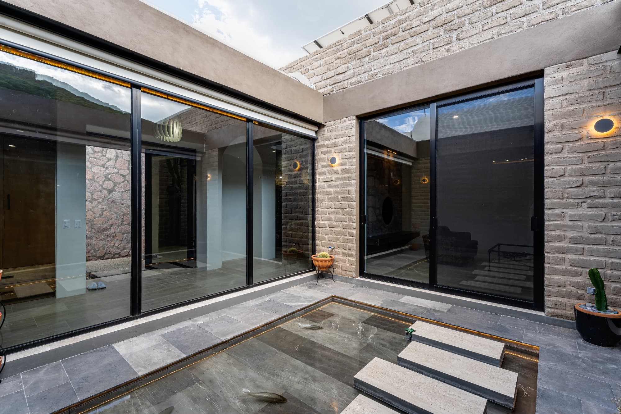 Santuario Tierra Viva — Sosnabar, San Miguel de Allende — photo 26 — modern courtyard with seamless indoor-outdoor living