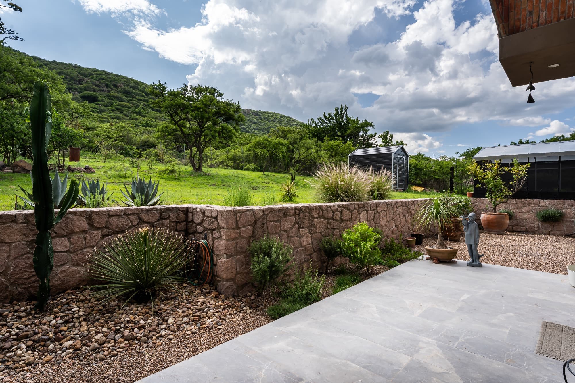 Santuario Tierra Viva — Sosnabar, San Miguel de Allende — photo 20 — lush hillside estate with mature gardens