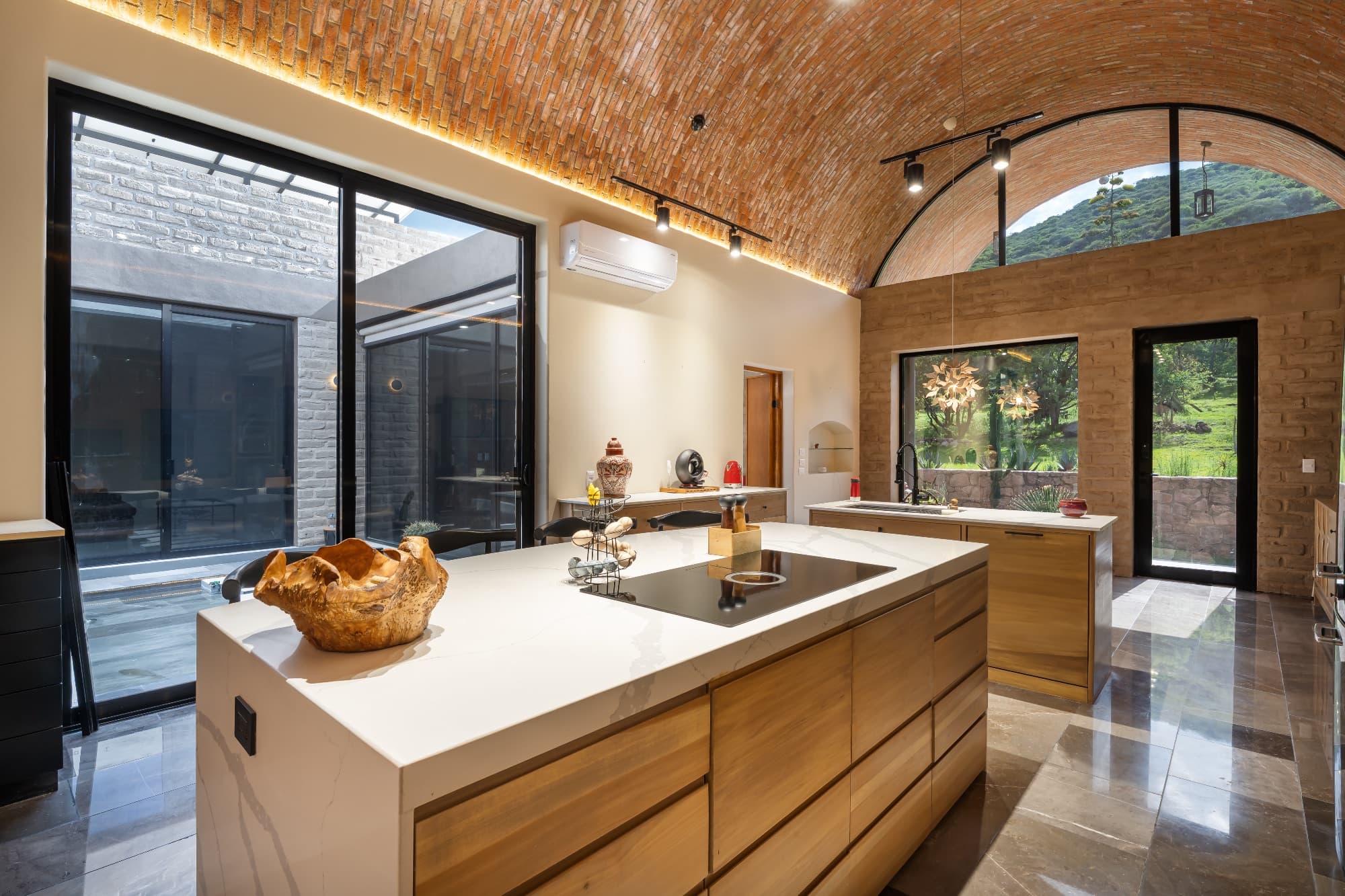 Santuario Tierra Viva — Sosnabar, San Miguel de Allende — photo 22 — modern luxury kitchen, mountain vistas