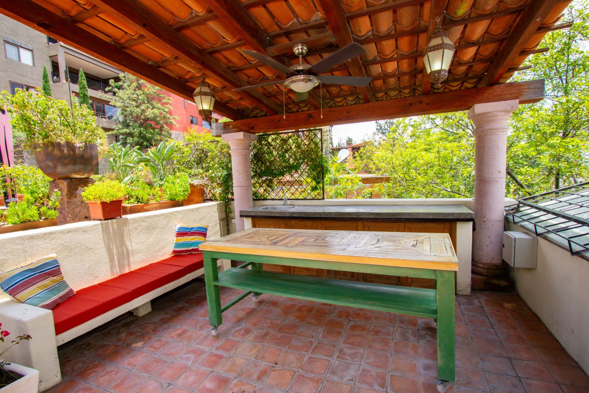 Condo Sto. Domingo — Centro, San Miguel de Allende — photo 16 — charming covered terrace, lush gardens