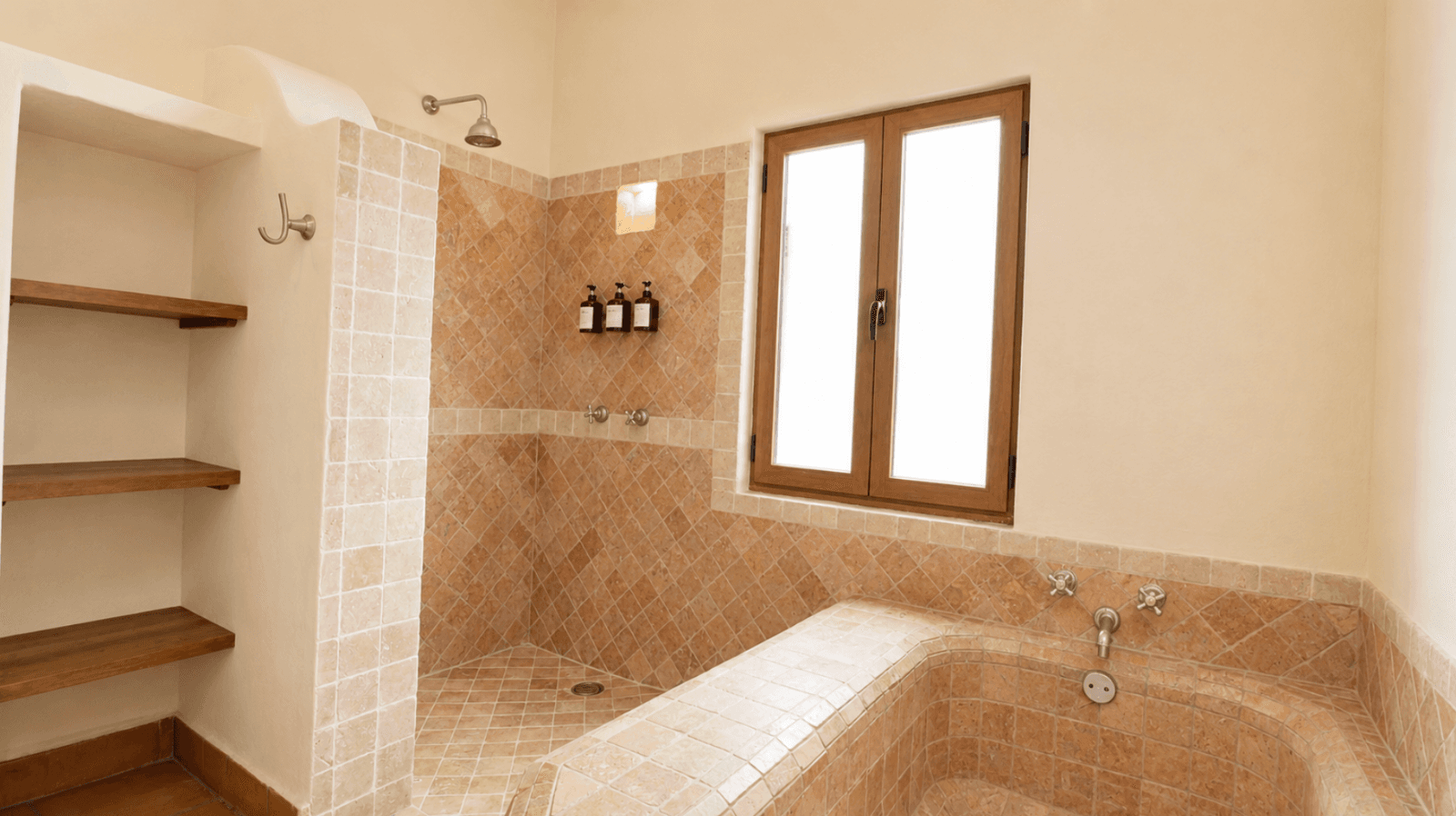 Casa Encantada — Sosnabar, San Miguel de Allende — photo 18 — spa-like ensuite with travertine elegance