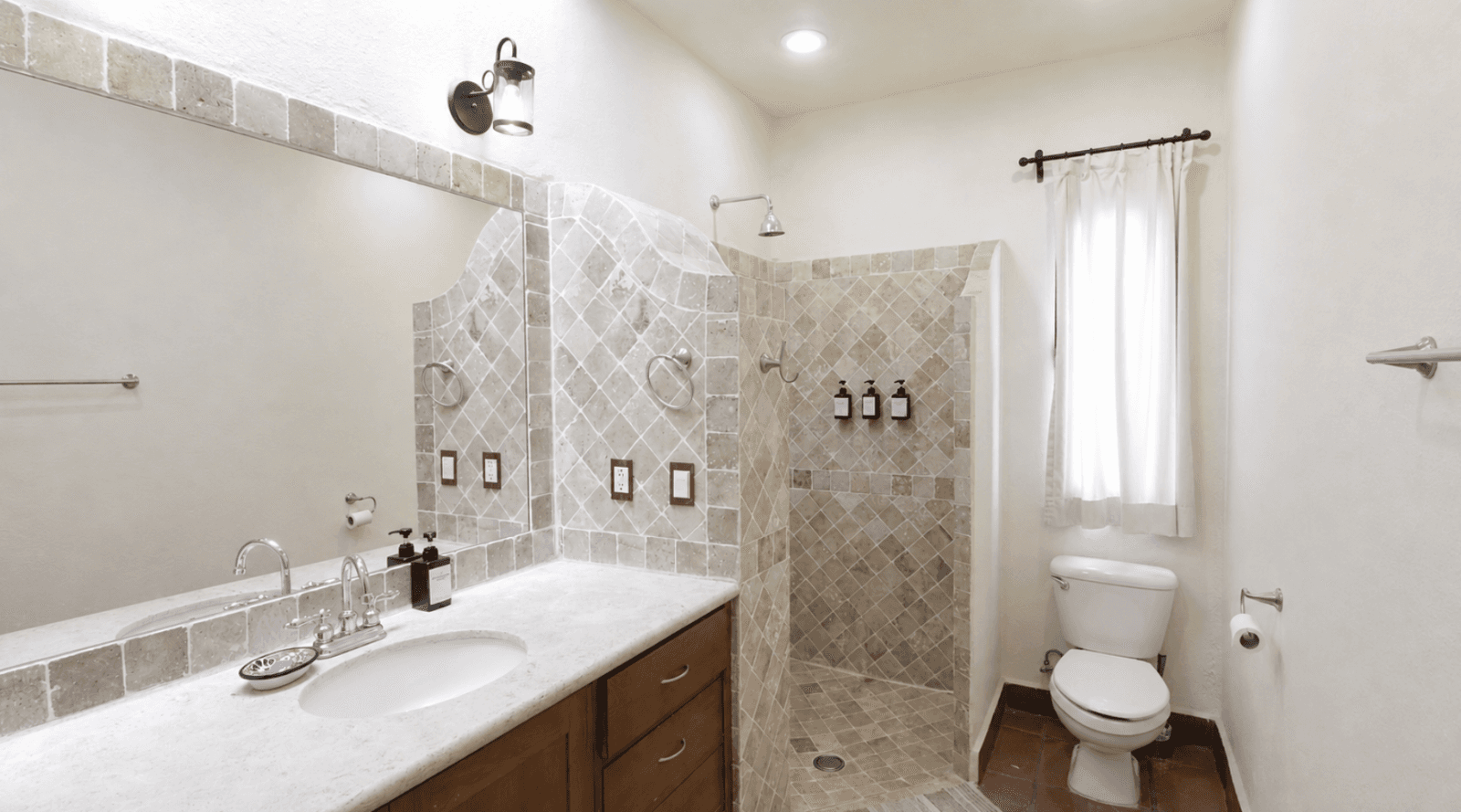 Casa Encantada — Sosnabar, San Miguel de Allende — photo 16 — spa-inspired ensuite with designer finishes