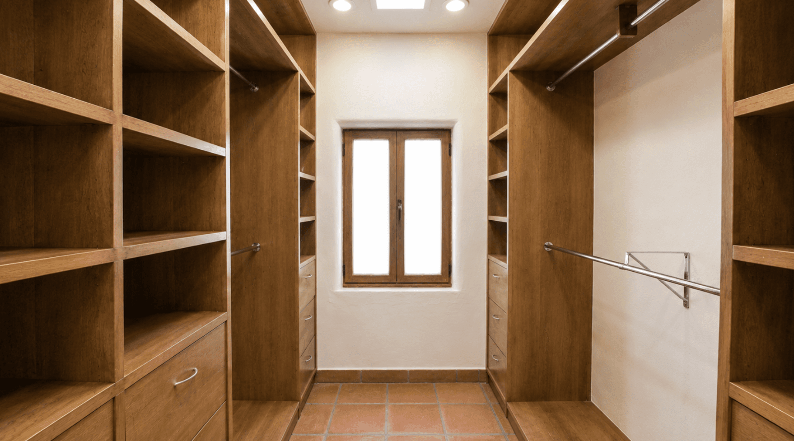 Casa Encantada — Sosnabar, San Miguel de Allende — photo 20 — luxurious walk-in closet, curated elegance
