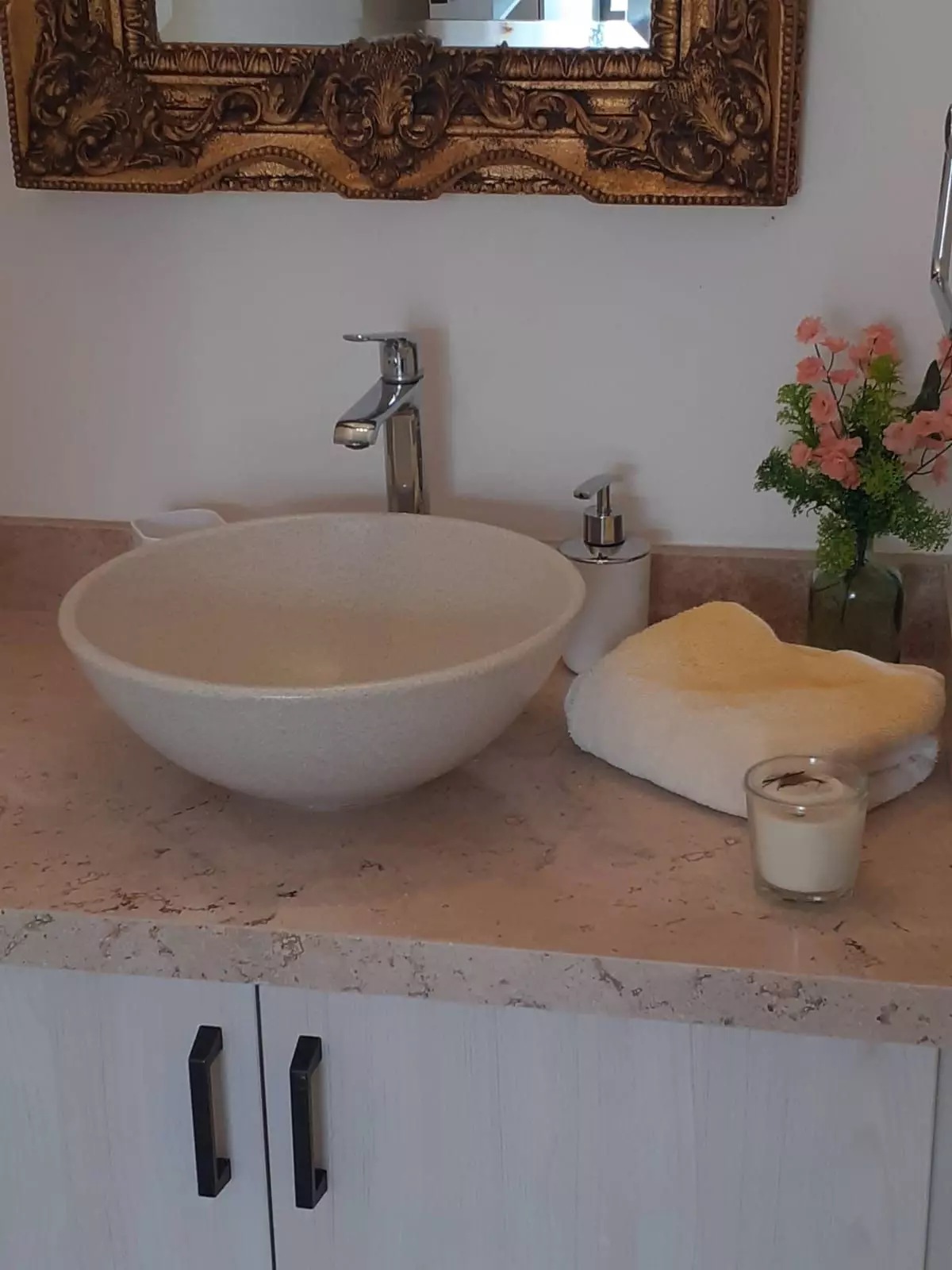 Luminaria Aprtment — El Paraiso, San Miguel de Allende — photo 10 — artisanal vanity, elegant travertine countertop