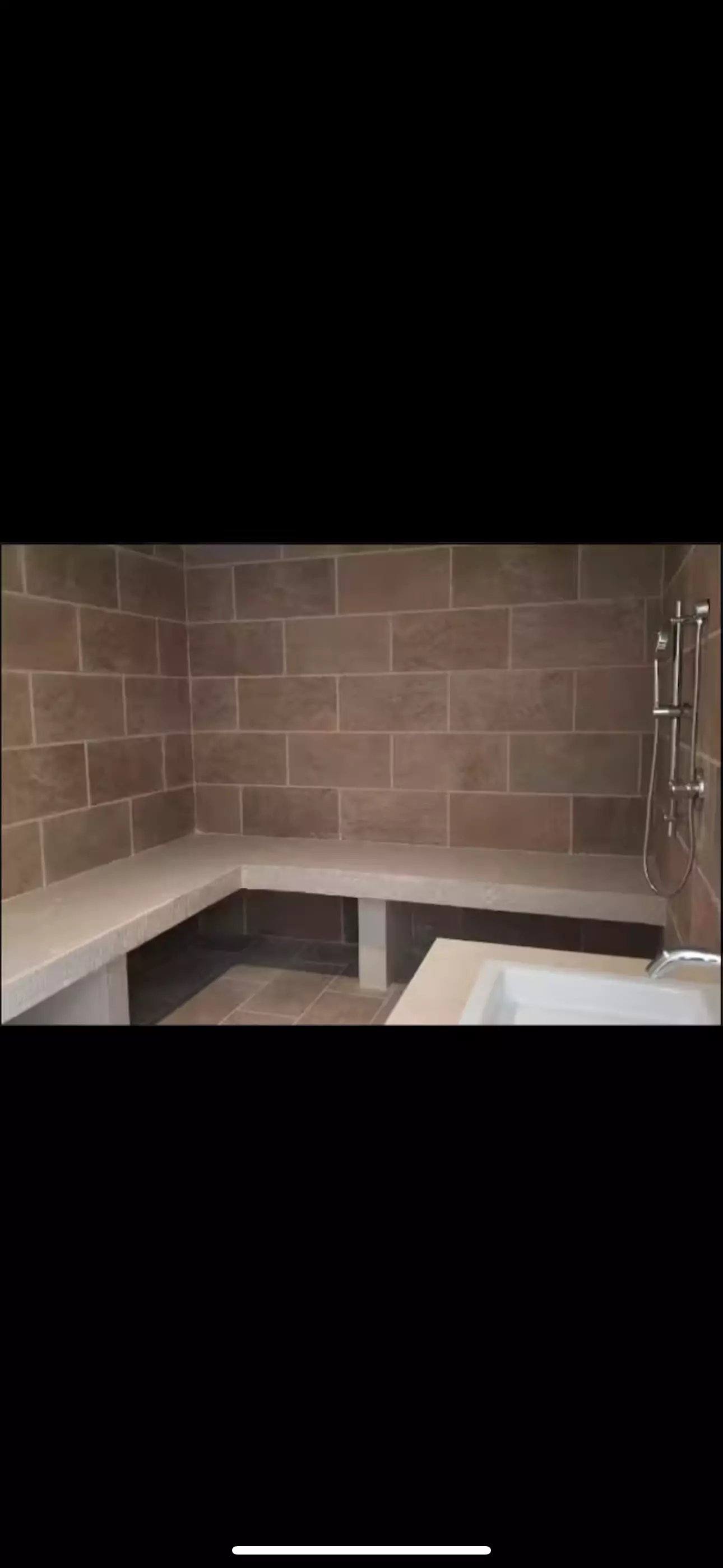 Luminaria Aprtment — El Paraiso, San Miguel de Allende — photo 18 — spa-inspired shower with elegant tile finishes