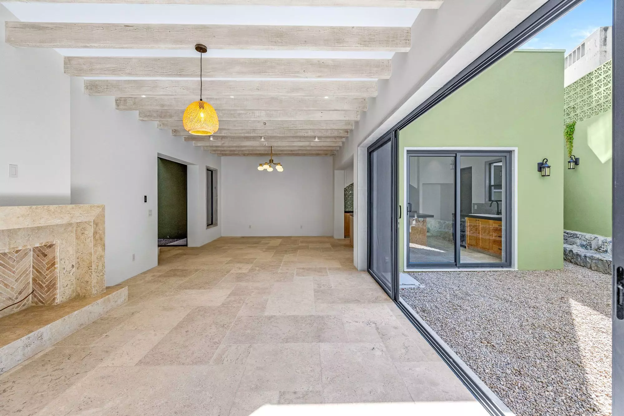 Casa Grillo — Guadiana, San Miguel de Allende — photo 3 — bright open-concept living with courtyard views