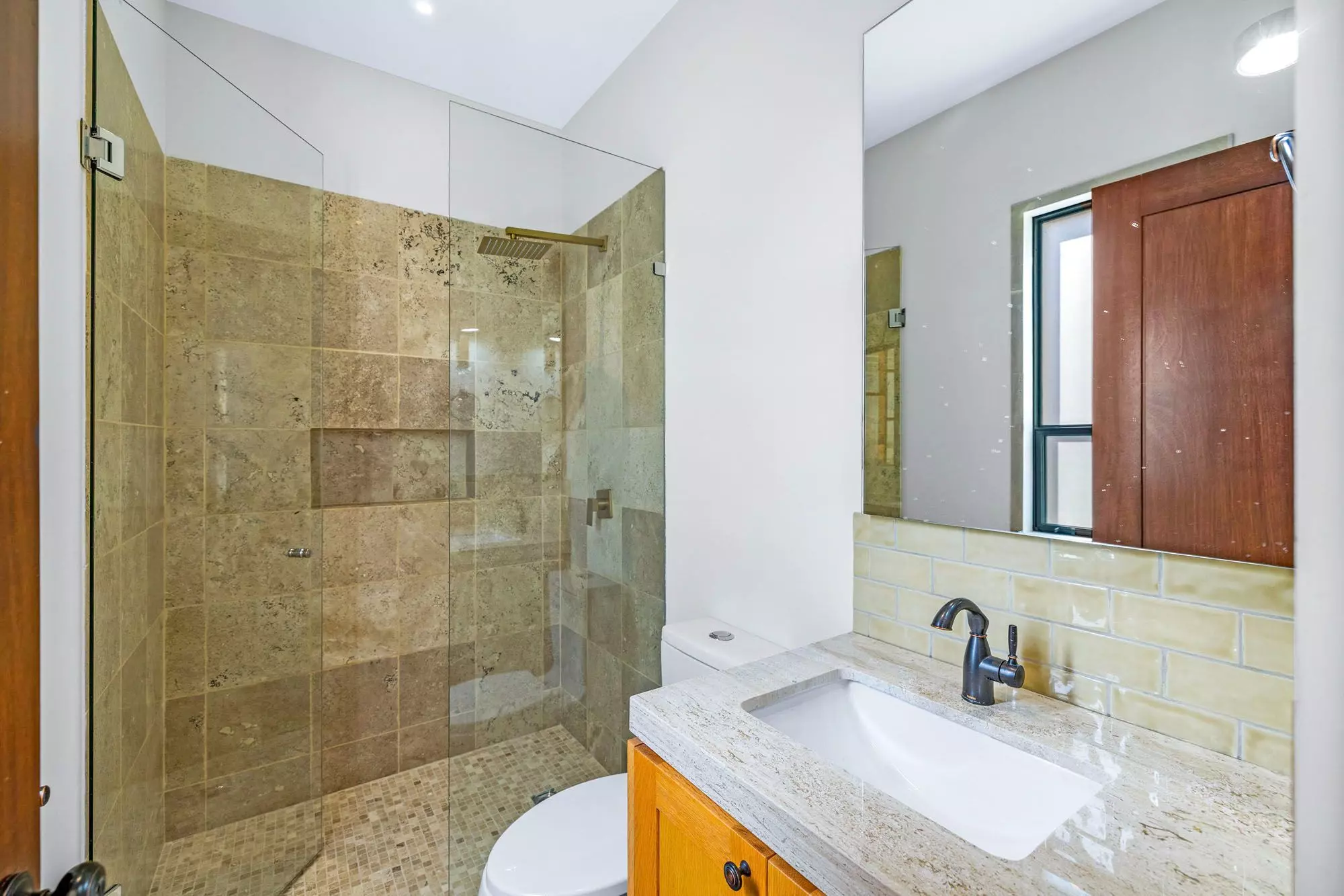 Casa Grillo — Guadiana, San Miguel de Allende — photo 9 — spa-inspired ensuite with travertine luxury