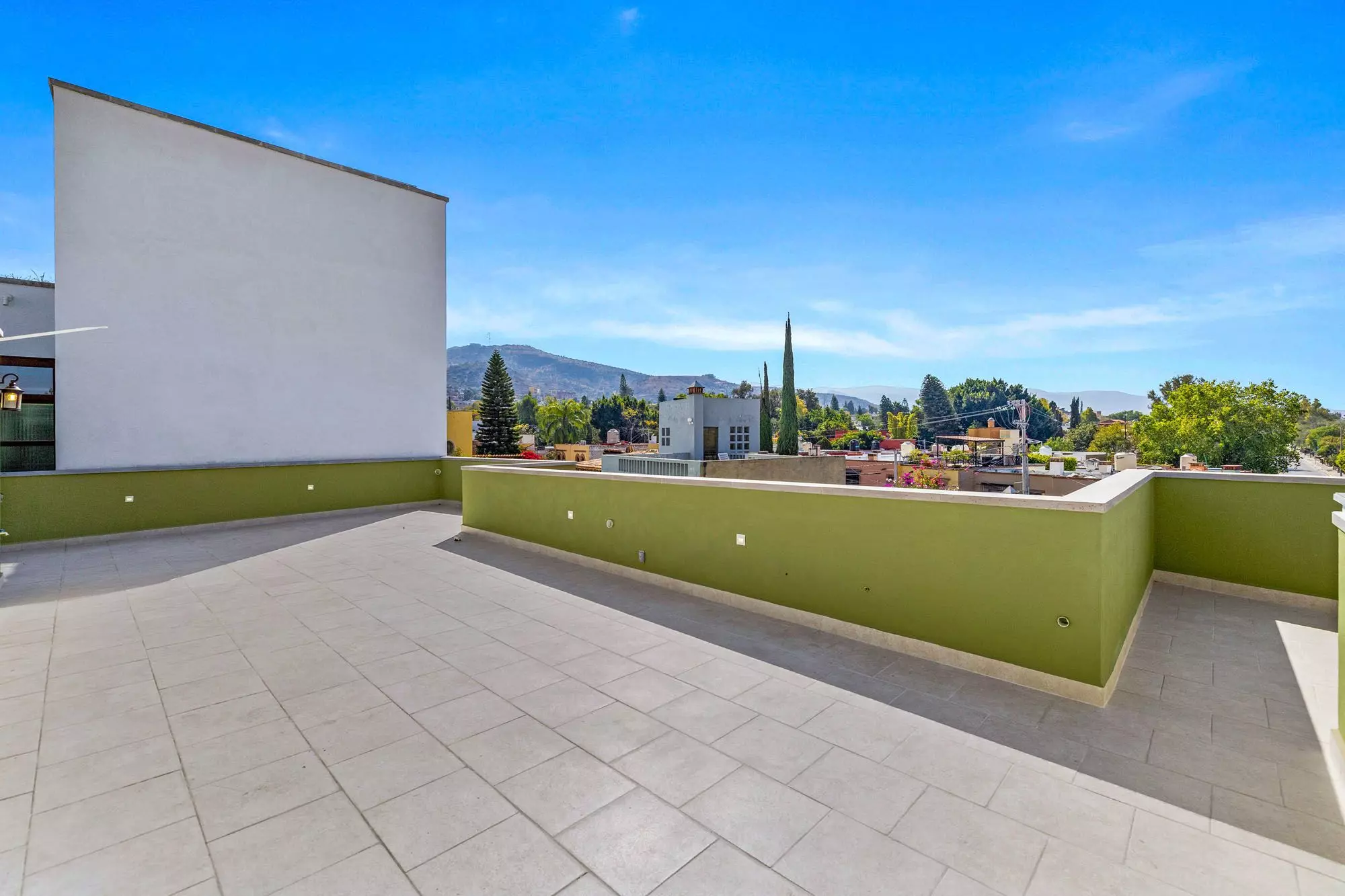 Casa Grillo — Guadiana, San Miguel de Allende — photo 25 — panoramic rooftop terrace, mountain views