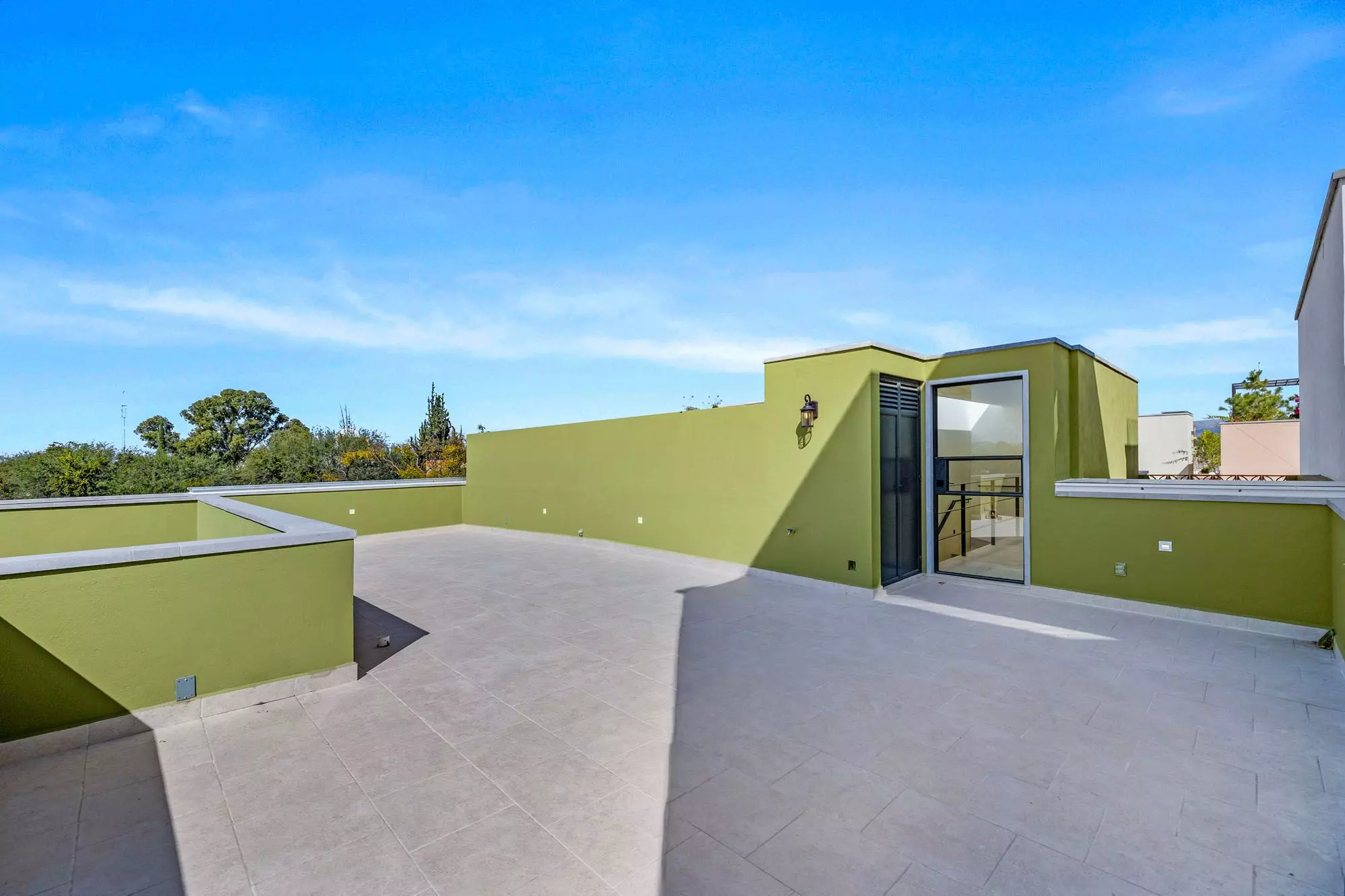 Casa Grillo — Guadiana, San Miguel de Allende — photo 24 — contemporary rooftop terrace, verdant views
