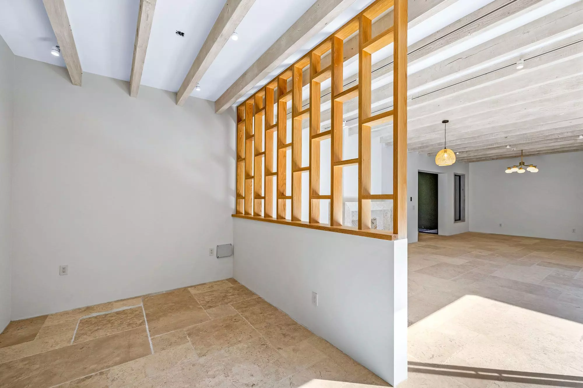 Casa Grillo — Guadiana, San Miguel de Allende — photo 7 — luminous open-concept living with architectural wood screens