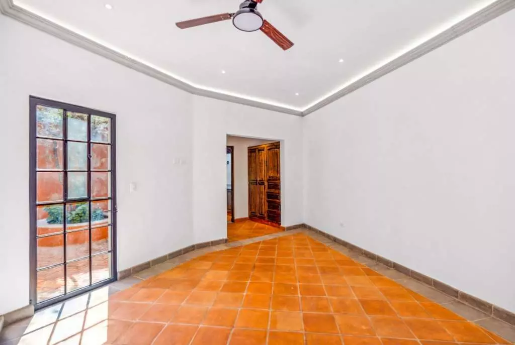 Villa Picasso — Guadiana, San Miguel de Allende — photo 11 — sun-drenched room, authentic terracotta floors