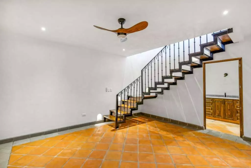 Villa Picasso — Guadiana, San Miguel de Allende — photo 18 — elegant floating staircase, soaring spaces