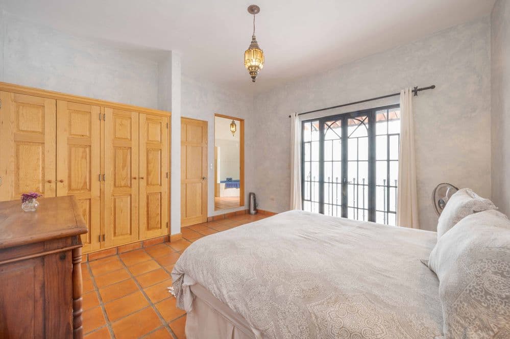 Casa Tranquila — San Antonio, San Miguel de Allende — photo 20 — serene master suite, authentic mexican charm