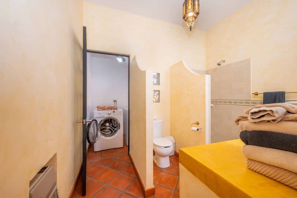 Casa Tranquila — San Antonio, San Miguel de Allende — photo 12 — charming utility space, warm terracotta floors
