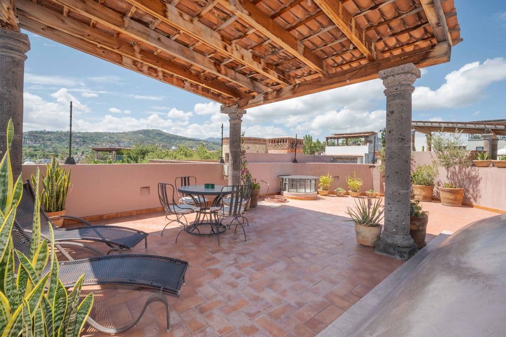 Casa Tranquila — San Antonio, San Miguel de Allende — photo 22 — expansive rooftop terrace, mountain views
