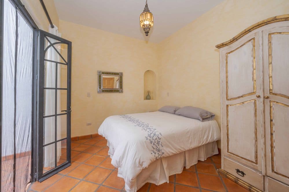 Casa Tranquila — San Antonio, San Miguel de Allende — photo 9 — charming bedroom with warm sunlight