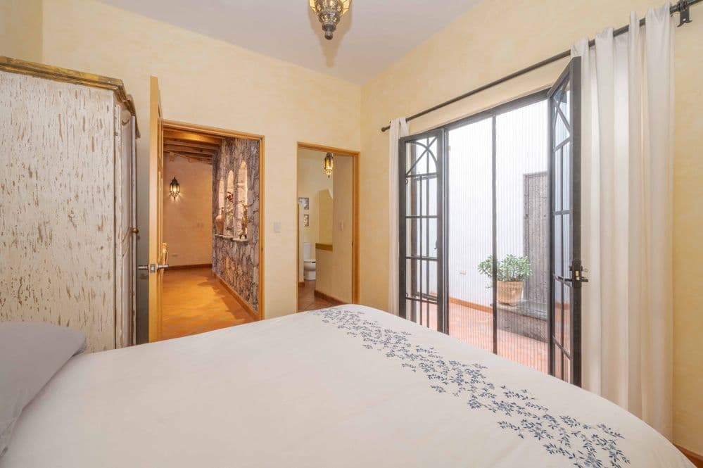 Casa Tranquila — San Antonio, San Miguel de Allende — photo 10 — sun-drenched master suite with terrace views