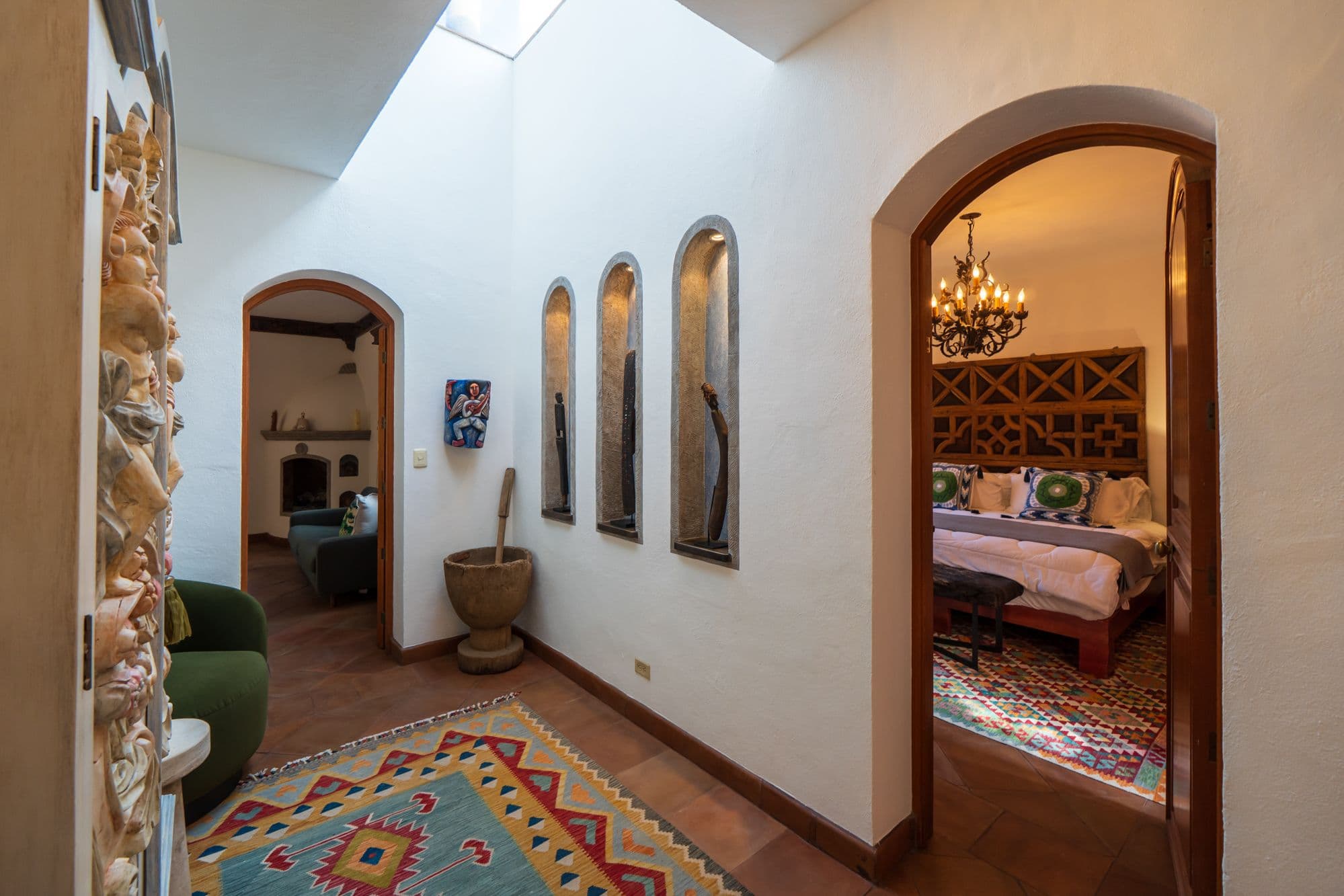 Casa Paraiso — Centro, San Miguel de Allende — photo 14 — elegant colonial hallway with sculptural archways