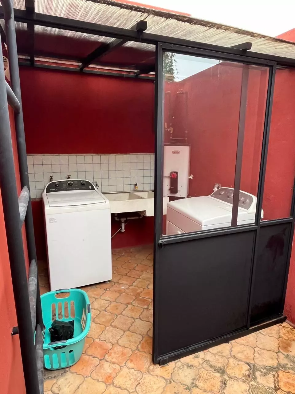 Casa 14 MIRAFLORES — Lindavista, San Miguel de Allende — photo 13 — charming laundry courtyard, vibrant mexican style