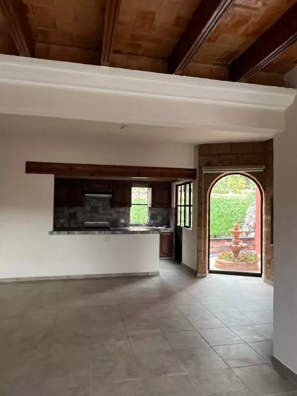 Casa 14 MIRAFLORES — Lindavista, San Miguel de Allende — photo 5 — elegant open-concept living with courtyard views