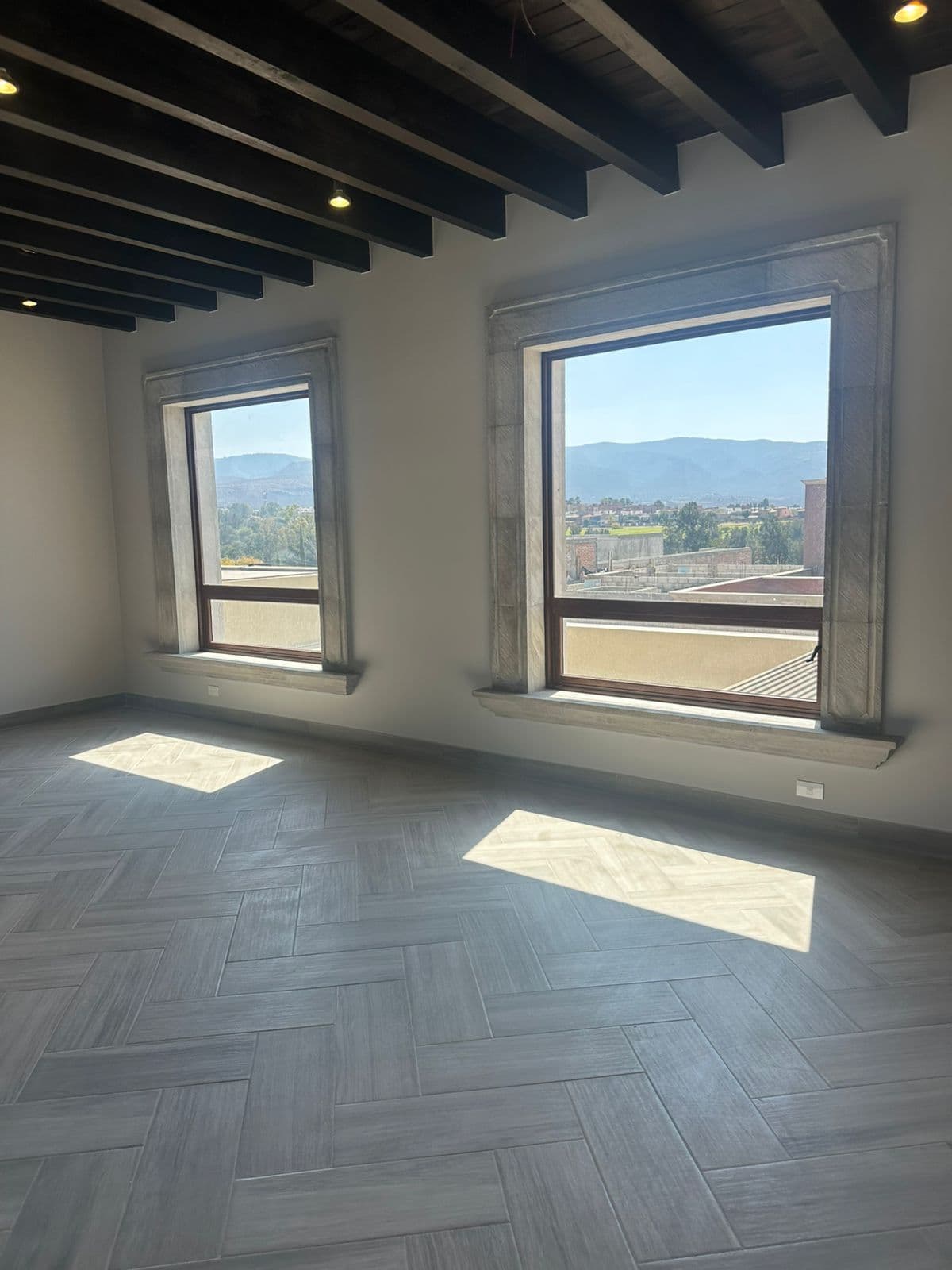 Casa Olivos — Residencial Malanquin la Mesa, San Miguel de Allende — photo 14 — sunlit sanctuary with panoramic mountain vistas