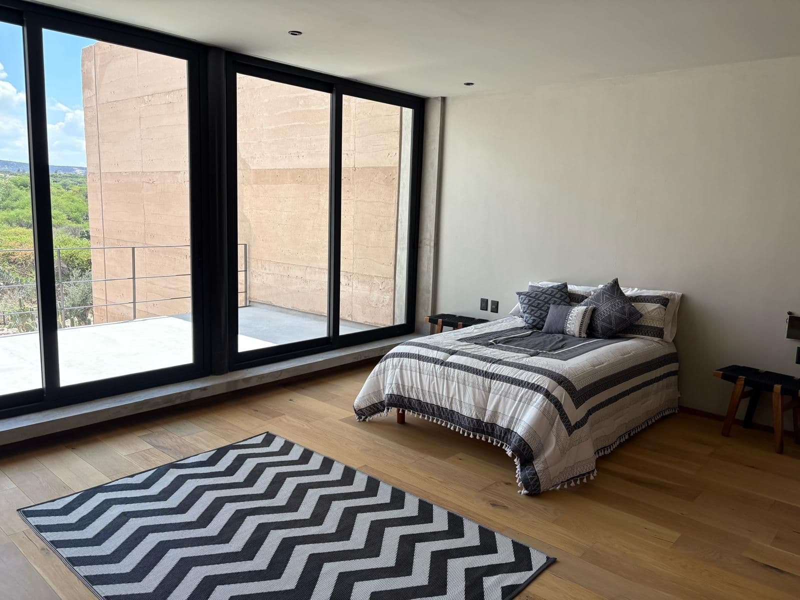 Villas Muros 10 — Los Senderos, Valle de los, San Miguel de Allende — photo 9 — sunlit primary suite with mountain views