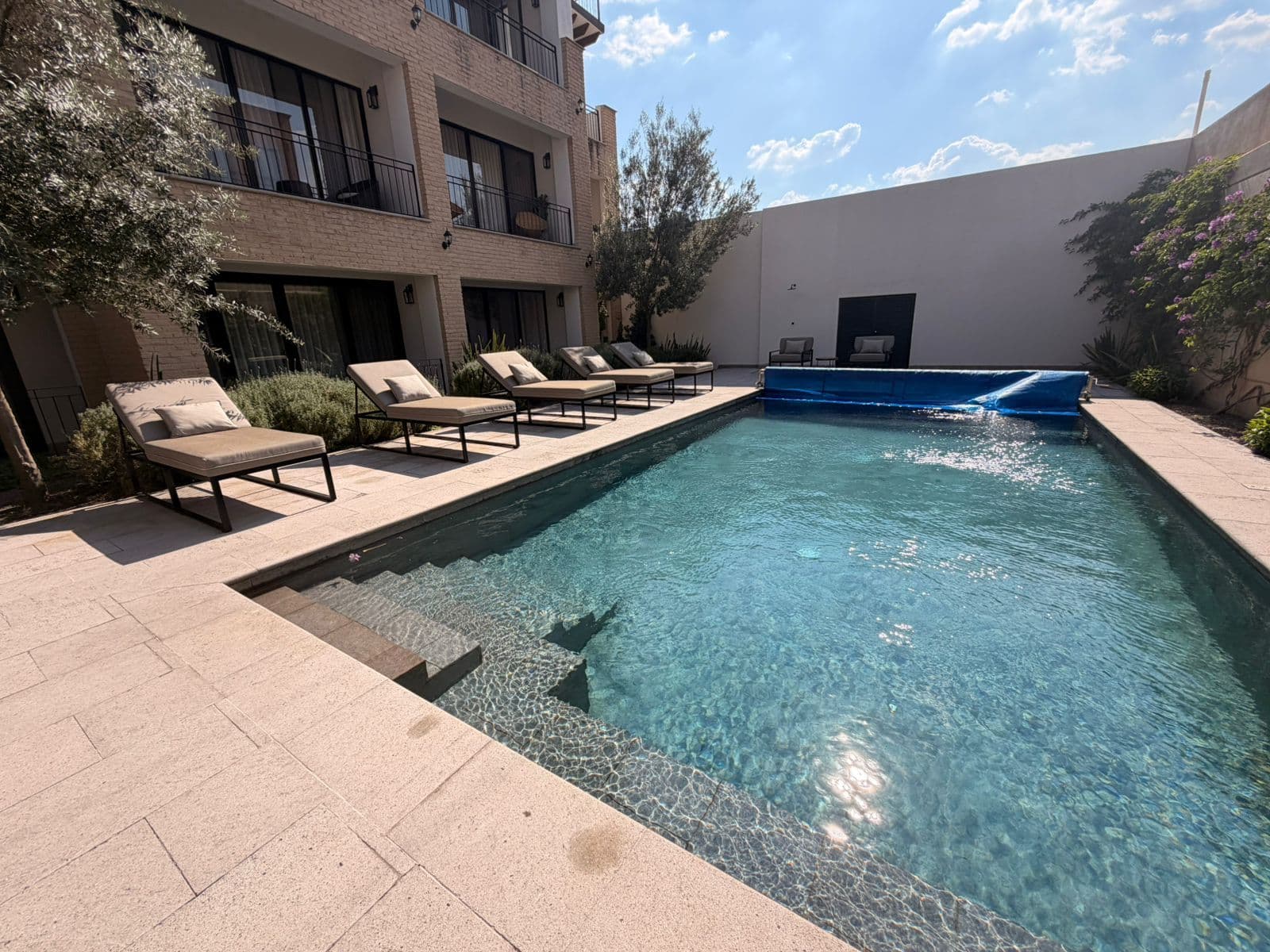 CALZADA DE LA ESTACIÓN 90 1305 — Centro, San Miguel de Allende — photo 16 — serene courtyard pool, architectural elegance