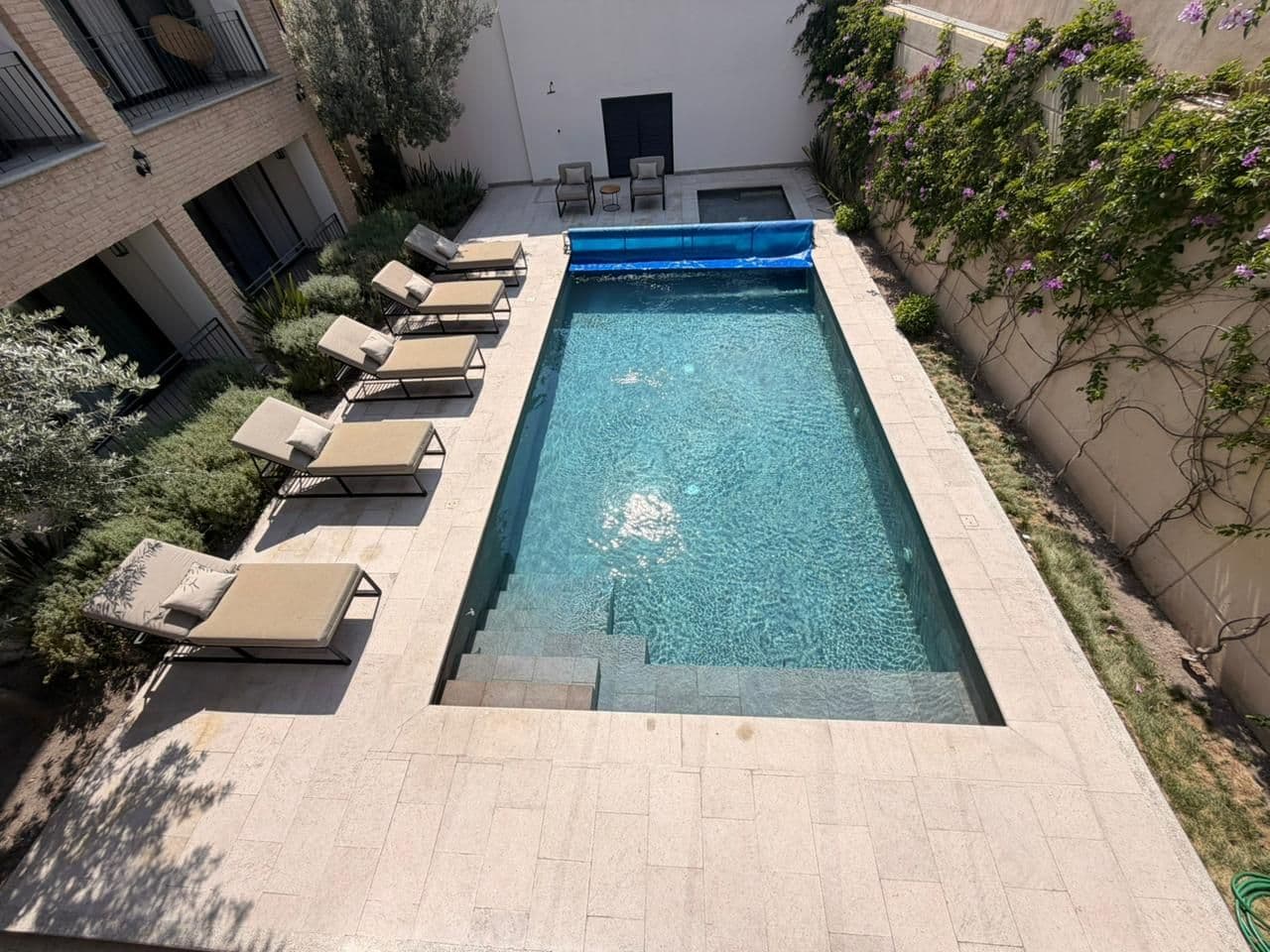 CALZADA DE LA ESTACIÓN 90 1305 — Centro, San Miguel de Allende — photo 18 — elegant courtyard pool, sun-drenched sanctuary