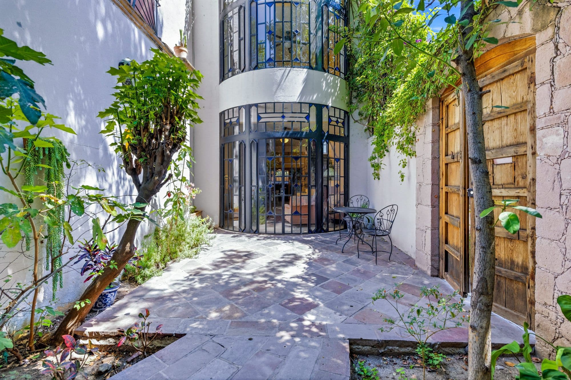 Casa Grande — Guadiana, San Miguel de Allende — photo 23 — charming courtyard, dappled sunlight, architectural character