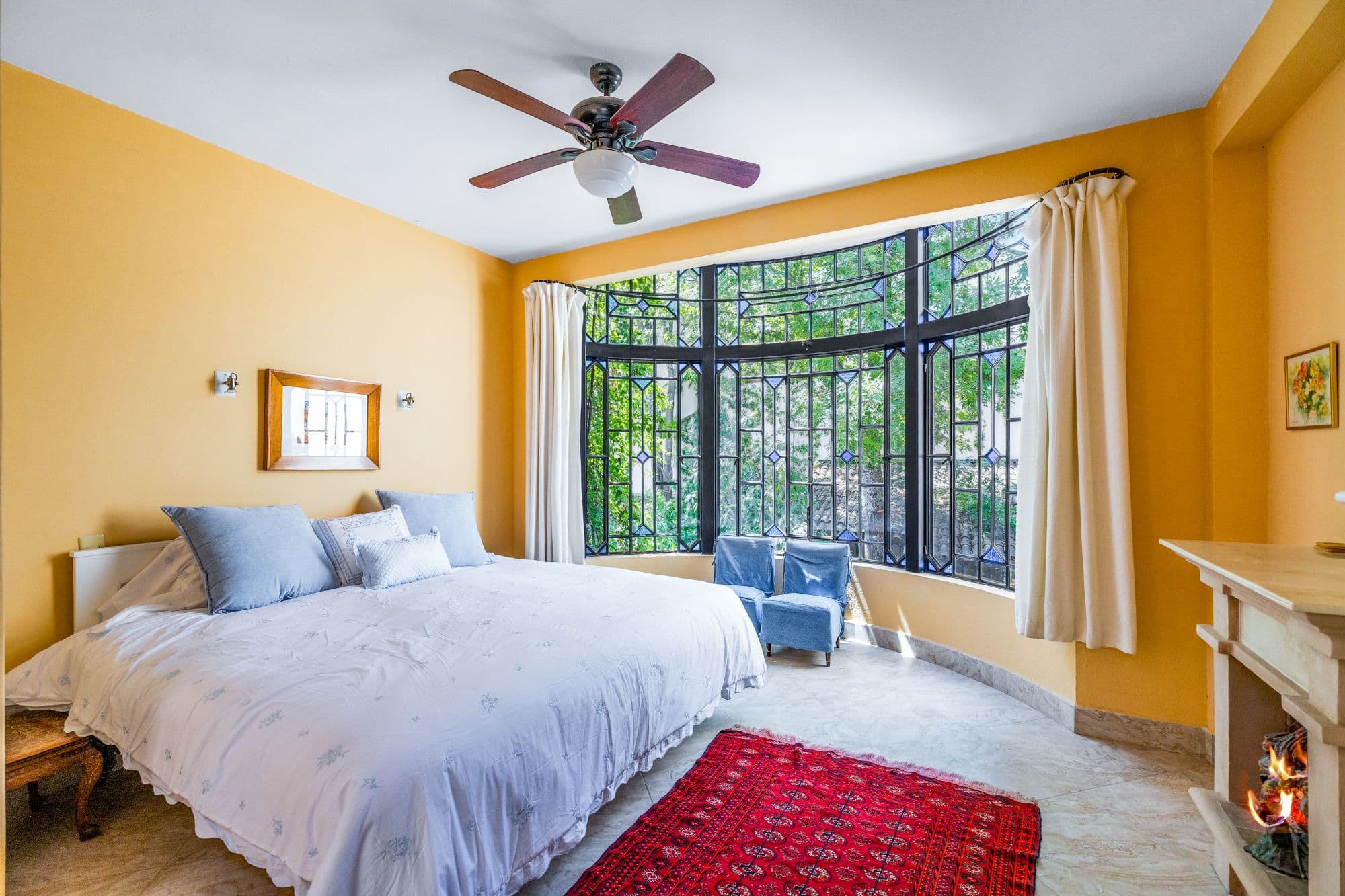 Casa Grande — Guadiana, San Miguel de Allende — photo 25 — sunlit master suite, verdant views