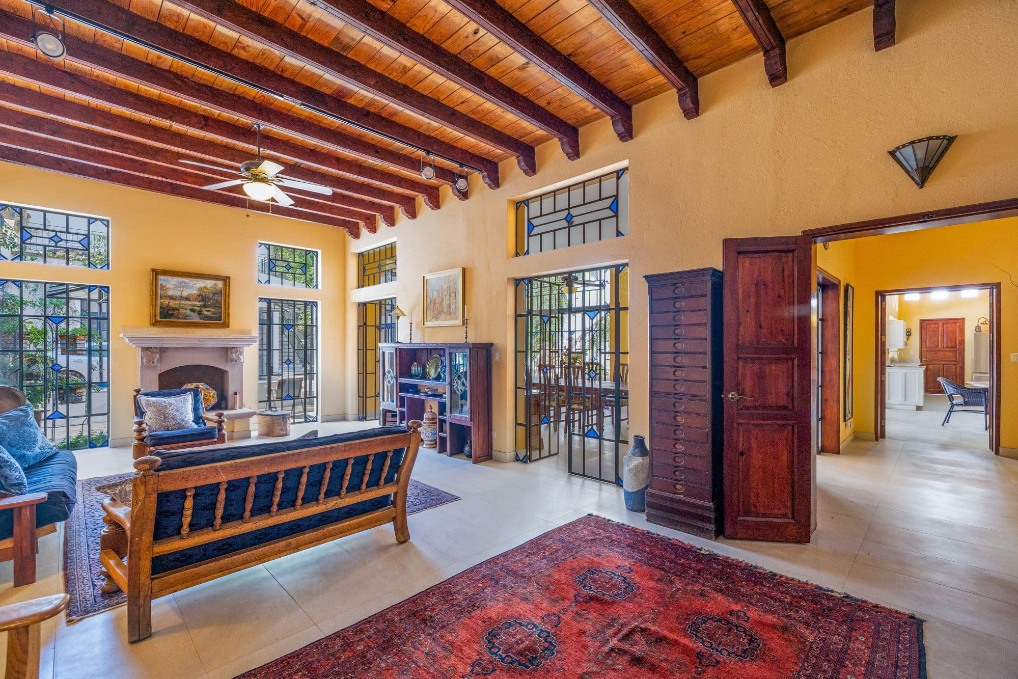 Casa Grande — Guadiana, San Miguel de Allende — photo 5 — sunlit colonial living room, authentic charm