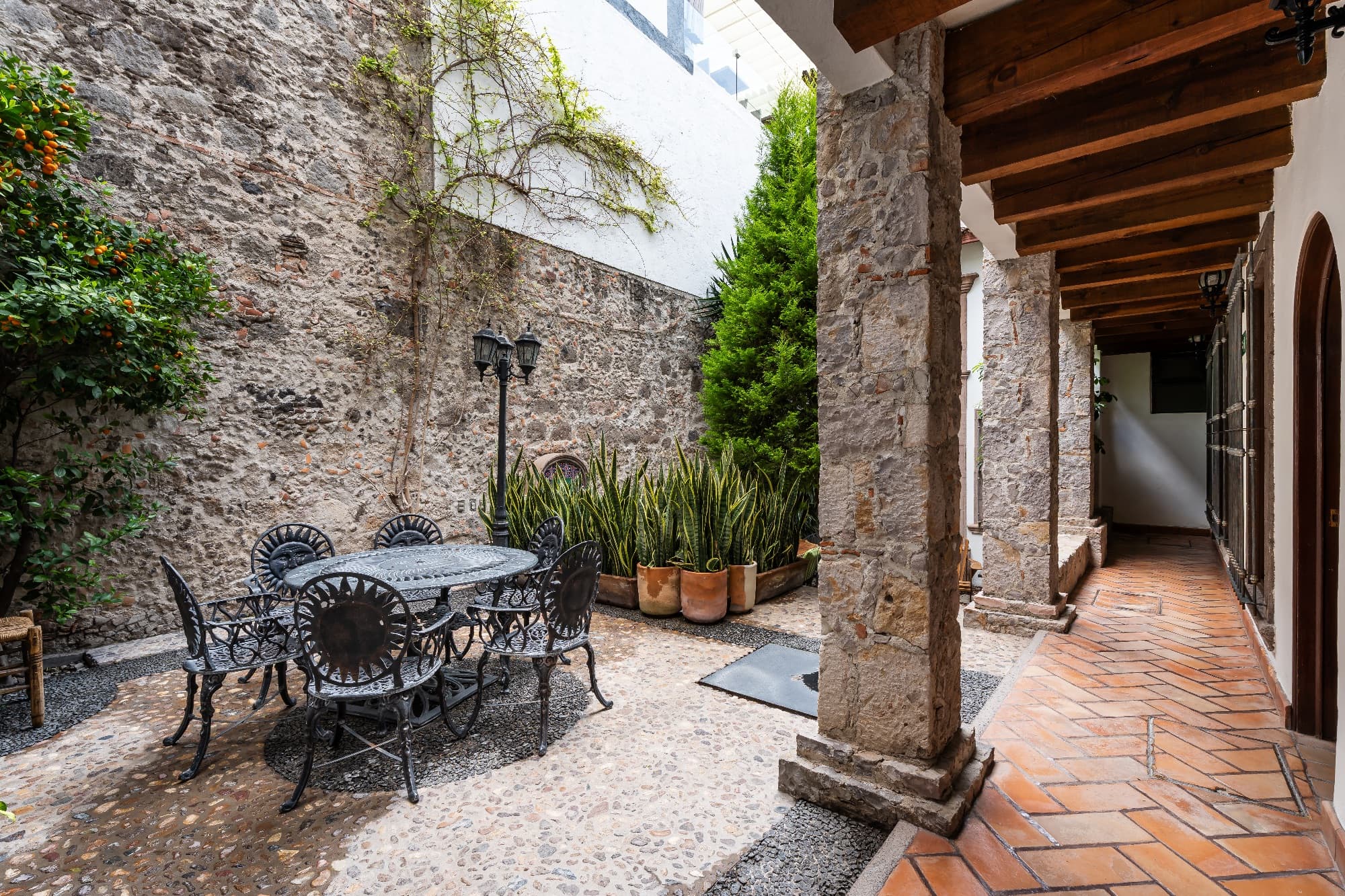 La Posadita — Centro, San Miguel de Allende — photo 17 — historic courtyard with charming stone elegance