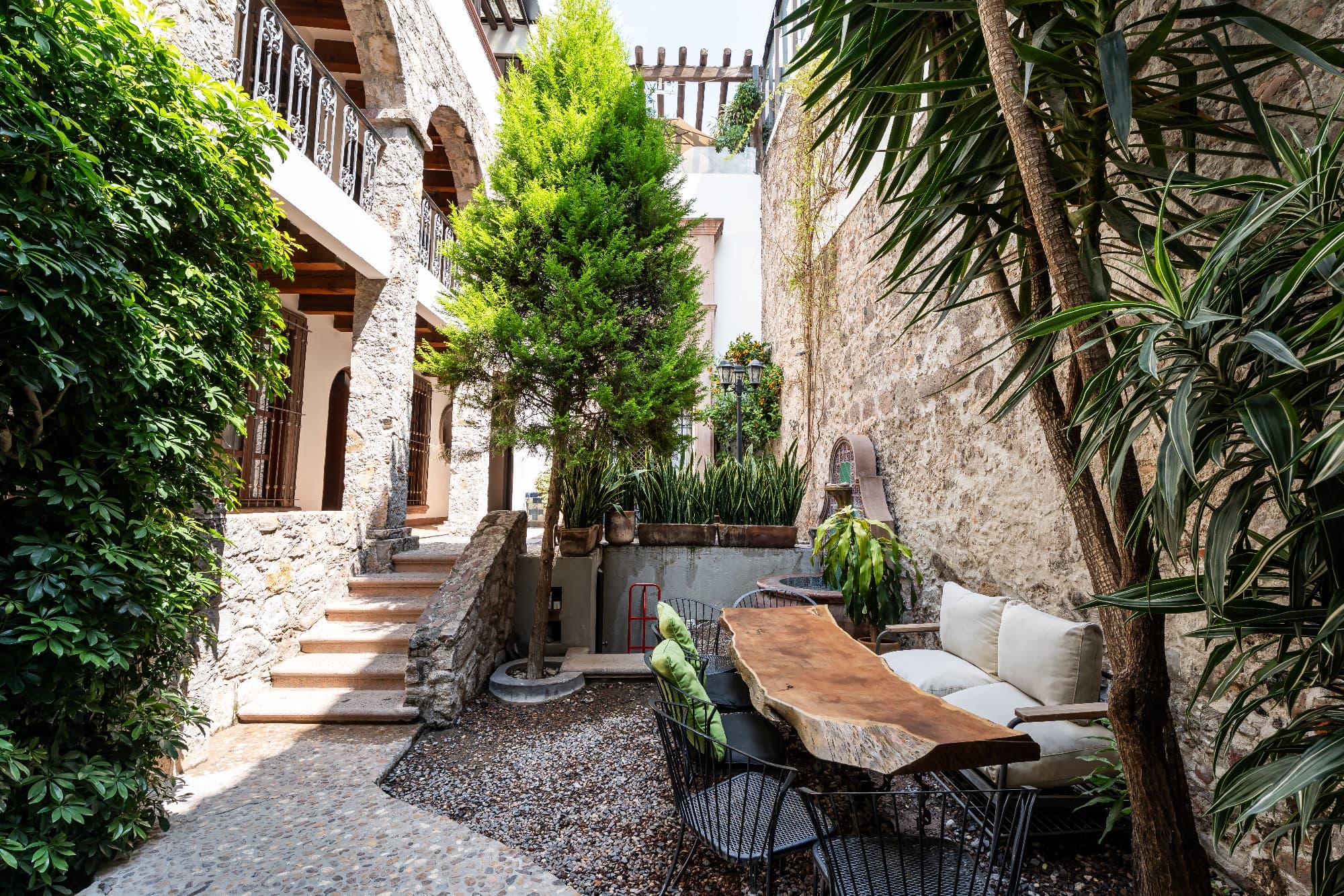 La Posadita — Centro, San Miguel de Allende — photo 20 — verdant courtyard, colonial stone charm